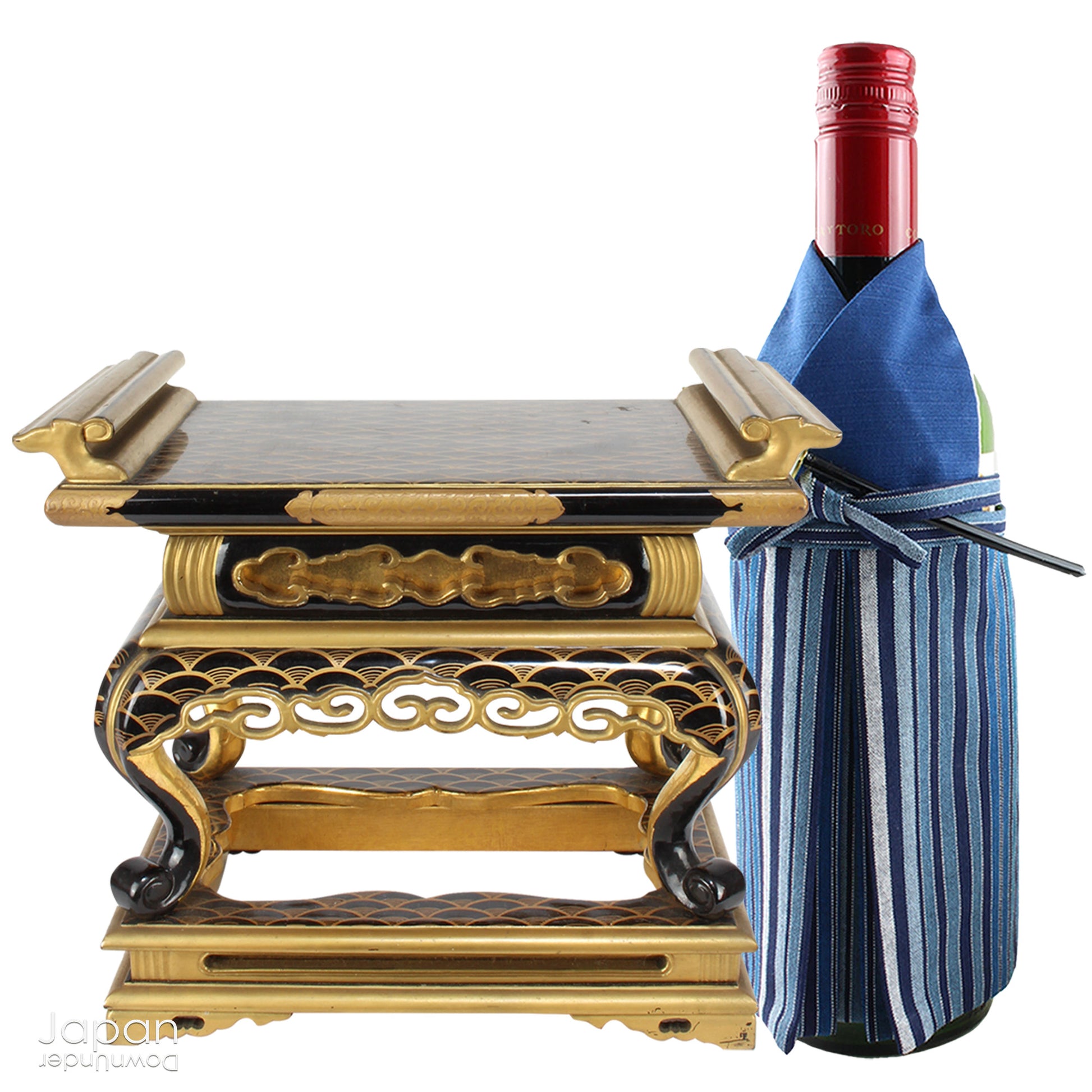 Add a touch of elegance to your space with this exquisite small antique Japanese sutra table. Intricately crafted with black lacquer and gold makie detailing, this table is perfect for displaying your favorite decor and religious items.