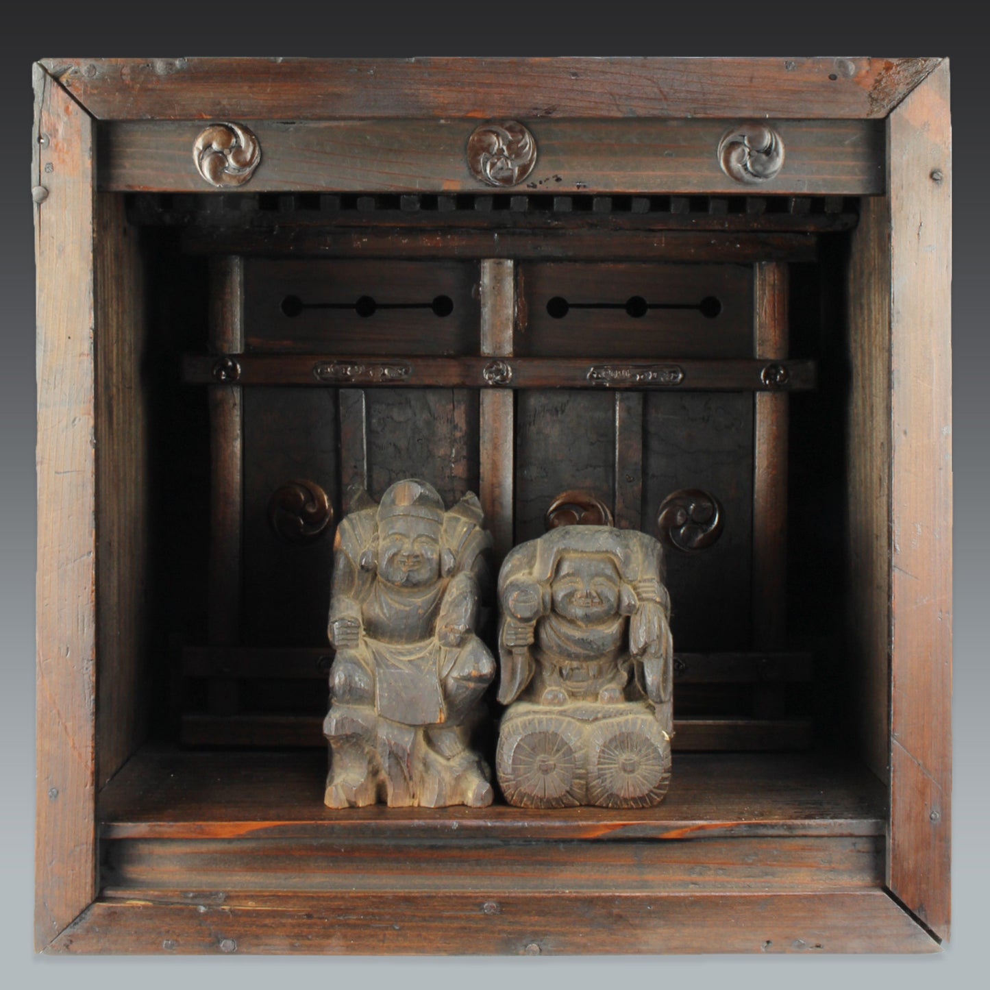 Bring a piece of history into your home with this rare 1800&#39;s Shinto folk faith shrine, perfect for creating a sacred space on your own god shelf or within your home. This antique religious decor piece includes the lucky gods, Ebisu and Daikoku.