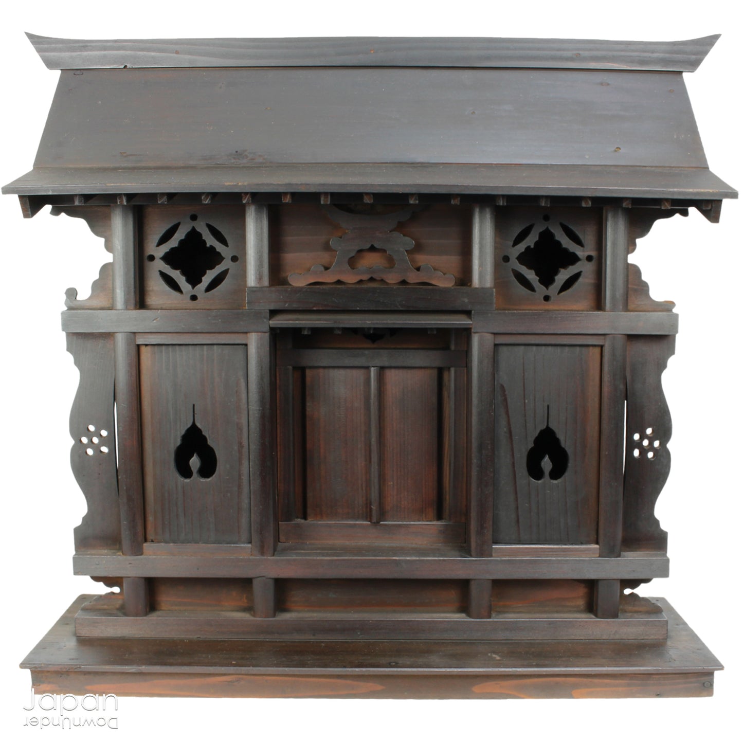 A wonderful antique folk art Japanese kamidana shrine that exudes a beautiful rustic charm, sure to add a touch of serenity to your living space. Crafted with intricate details and a timeless aesthetic.