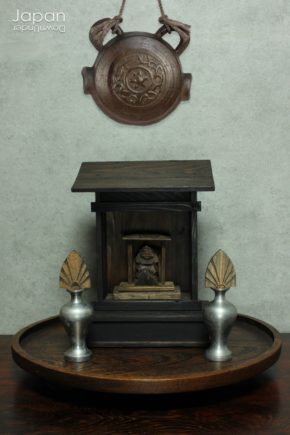 A perfect addition to your spiritual space, this quaint rustic antique Shinto shrine, made to be placed on the kamidana (god shelf), houses the lucky god Ebisu. This charming hand crafted god house embodies the essence of Shinto folk faith.