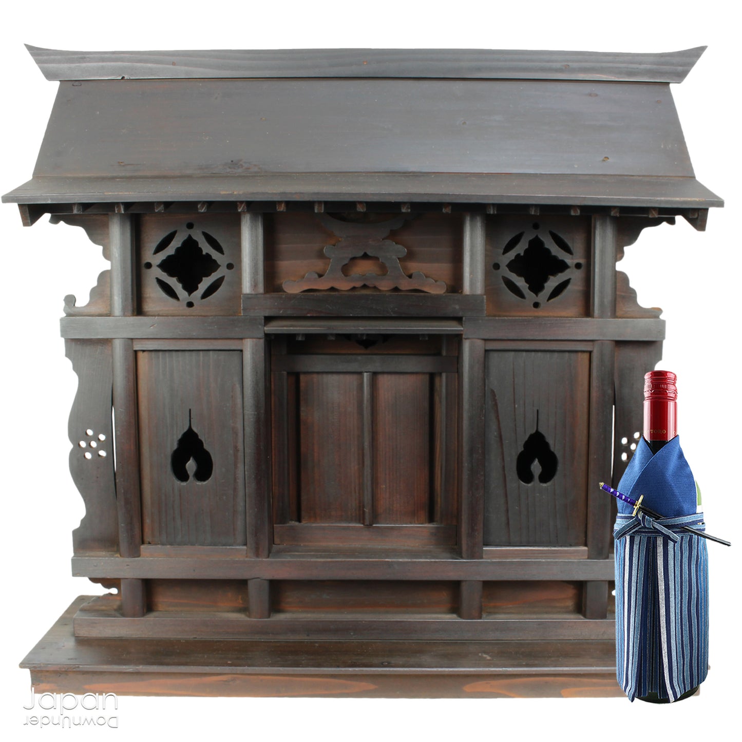 A wonderful antique folk art Japanese kamidana shrine that exudes a beautiful rustic charm, sure to add a touch of serenity to your living space. Crafted with intricate details and a timeless aesthetic.