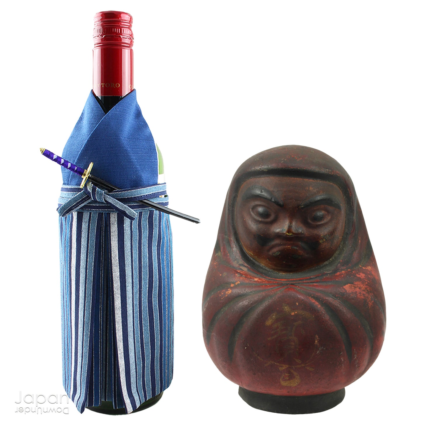 Add a touch of history to your home with this antique Meiji Era Hirashimizu ware lucky Daruma clay doll. Covered in soot it boasts a great darkened rustic patina that adds unique charm to any space. Bring a piece of the past into your modern decor.