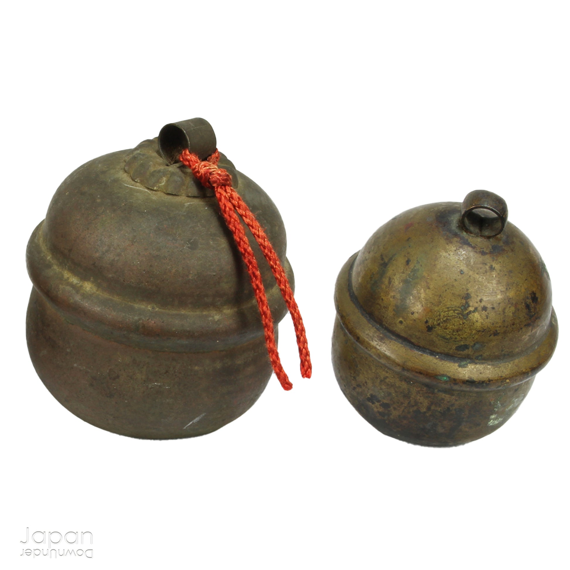 Bring a touch of timeless tradition into your home with this exquisite set of three antique Shinto bronze bell lucky charms, or omamori. Each bell boasts a beautiful, rich patina that speaks of its age and history, adding a unique, vintage charm to any space. These bells aren't just decorative; they are imbued with centuries of spiritual significance, believed to offer blessings, protection, and good fortune to those who possess them.