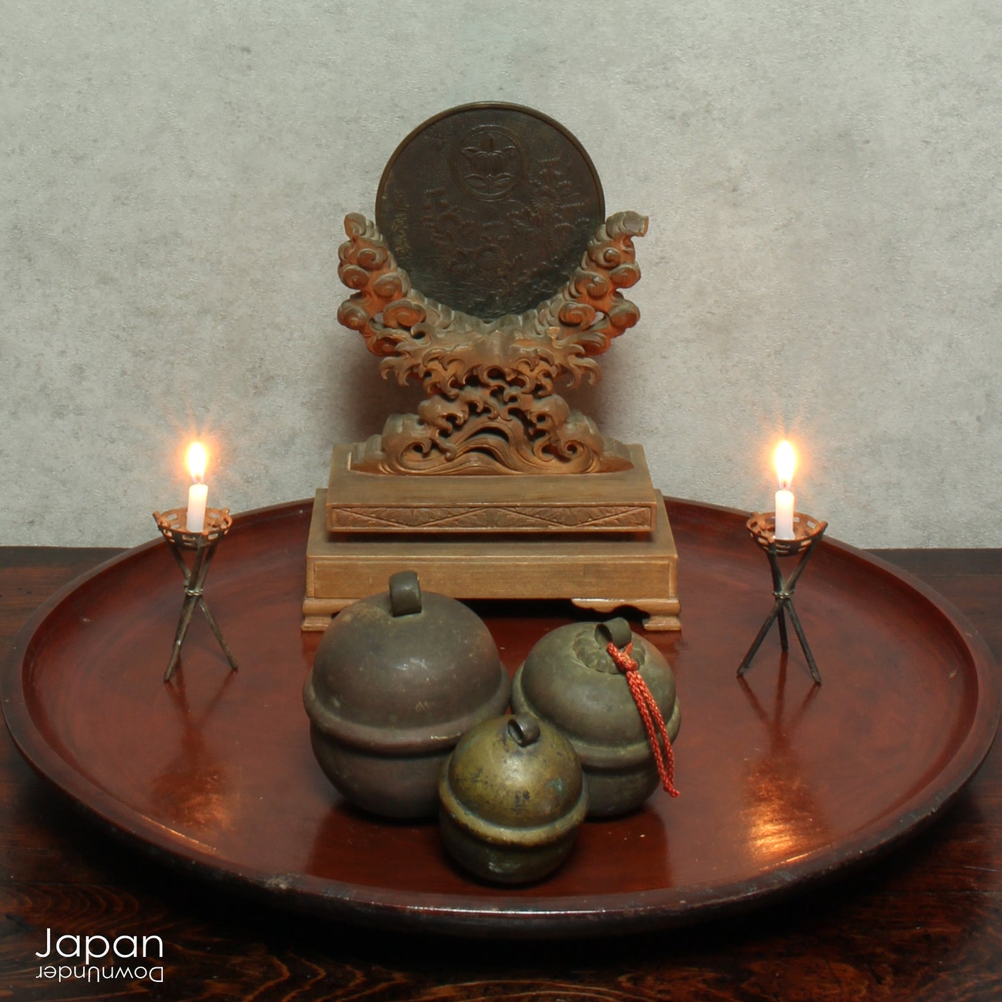 Bring a touch of timeless tradition into your home with this exquisite set of three antique Shinto bronze bell lucky charms, or omamori. Each bell boasts a beautiful, rich patina that speaks of its age and history, adding a unique, vintage charm to any space. These bells aren't just decorative; they are imbued with centuries of spiritual significance, believed to offer blessings, protection, and good fortune to those who possess them.