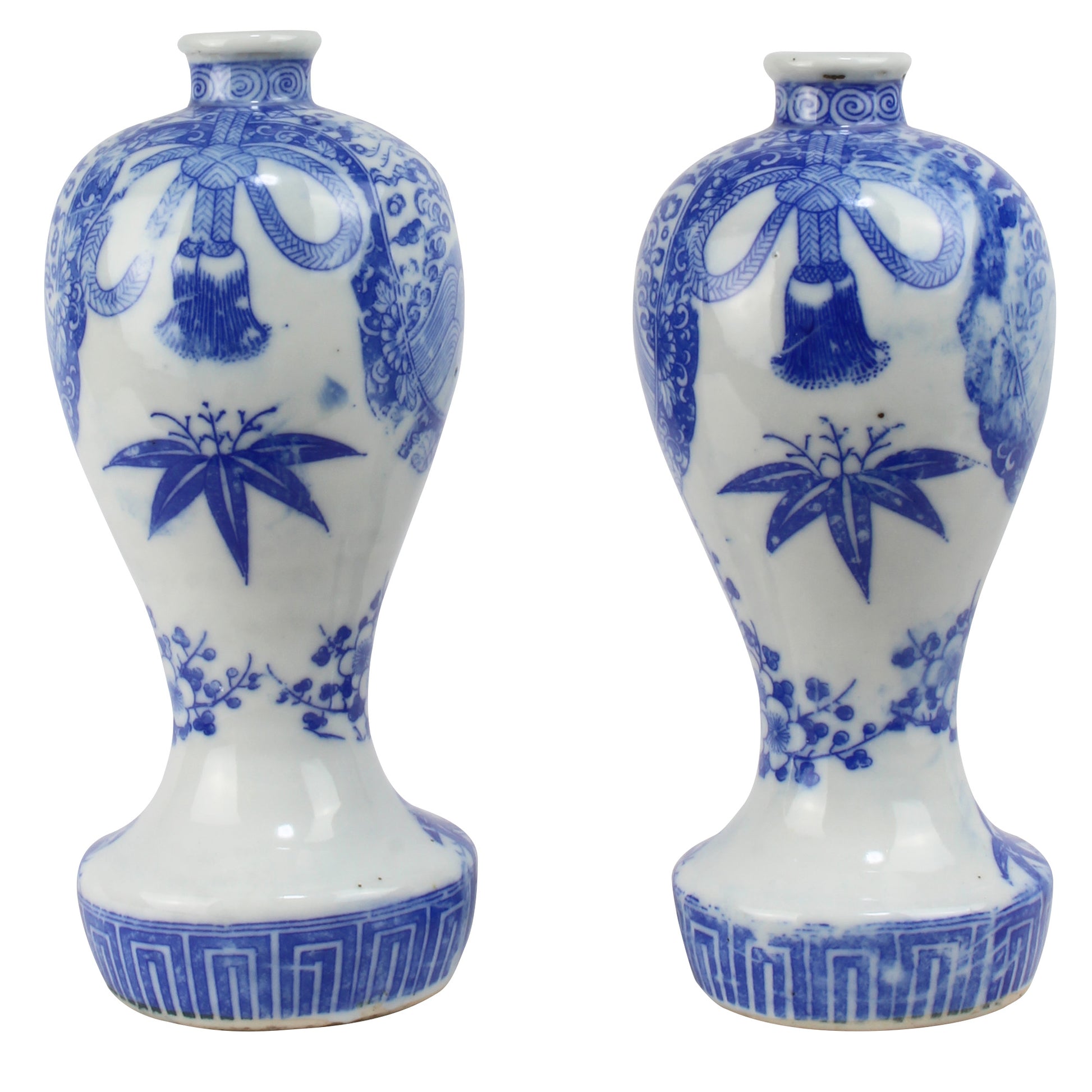 Enhance your sacred space with this wonderful pair of antique brass flames in old imari sake bottles, made to be offered at Shinto altars. Believed to attract prosperity and ward off evil, these unique pieces will bring a touch of tradition.