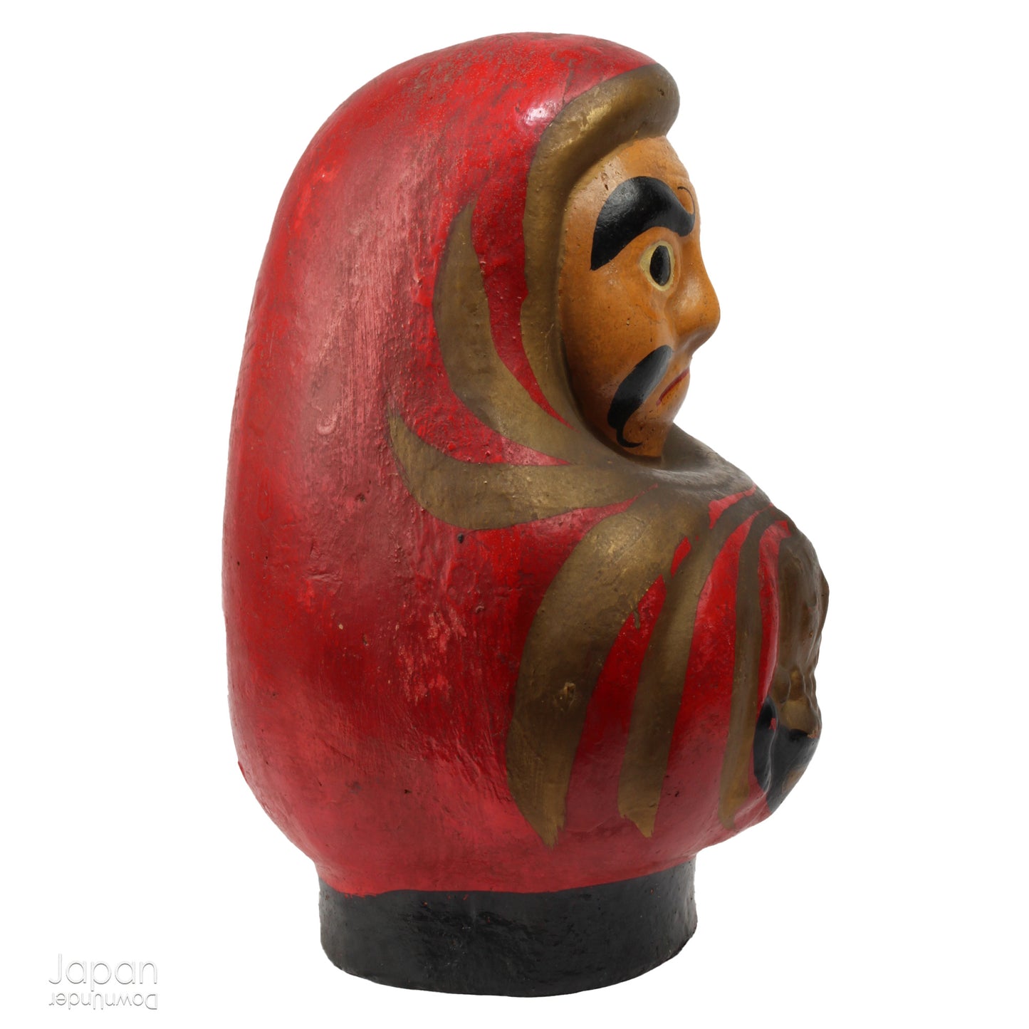 Add a touch of history to your home with this large antique Meiji Era lucky Daruma clay doll. No longer in production it boasts a great darkened rustic patina that adds unique charm to any space. Bring a piece of the past into your modern decor.