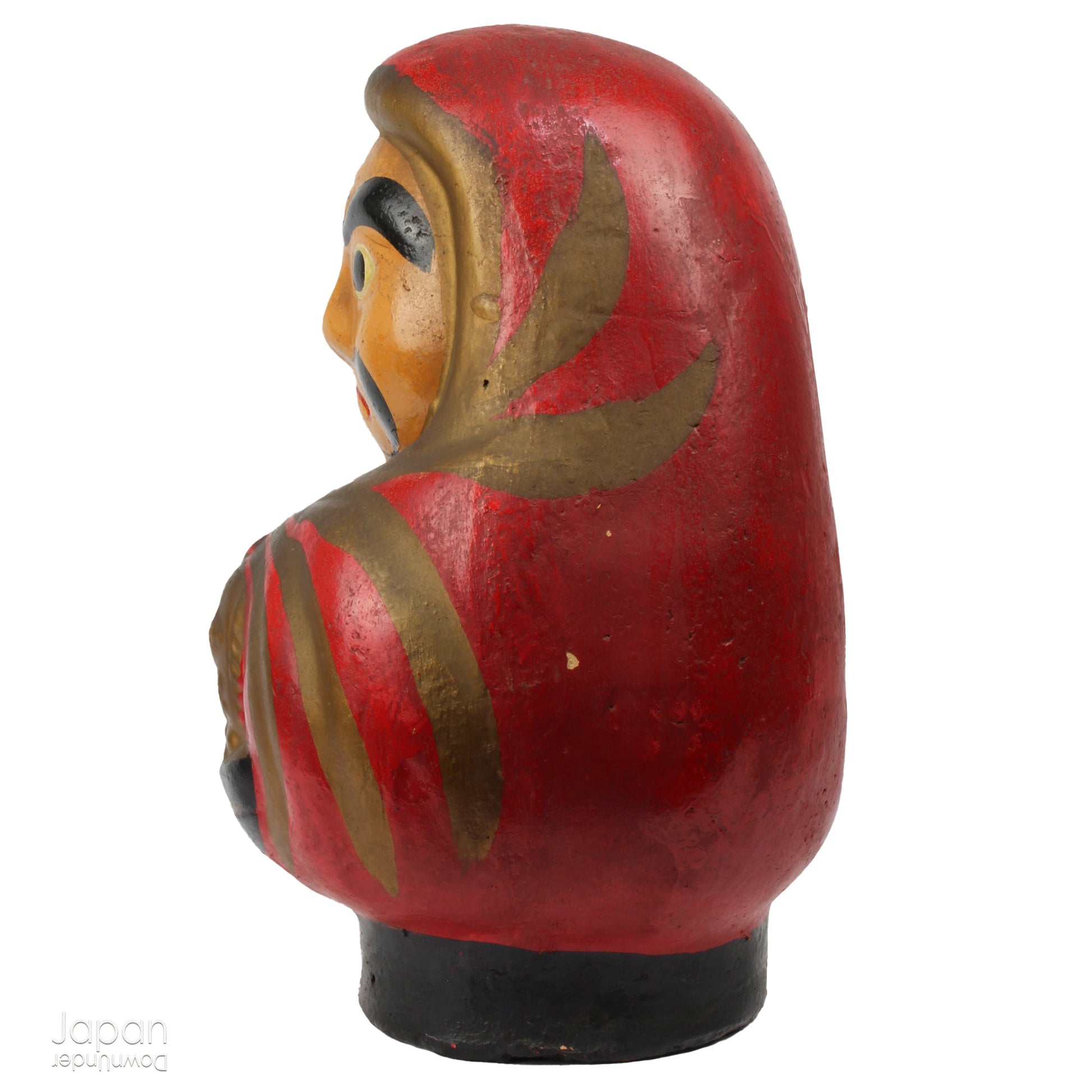 Add a touch of history to your home with this large antique Meiji Era lucky Daruma clay doll. No longer in production it boasts a great darkened rustic patina that adds unique charm to any space. Bring a piece of the past into your modern decor.