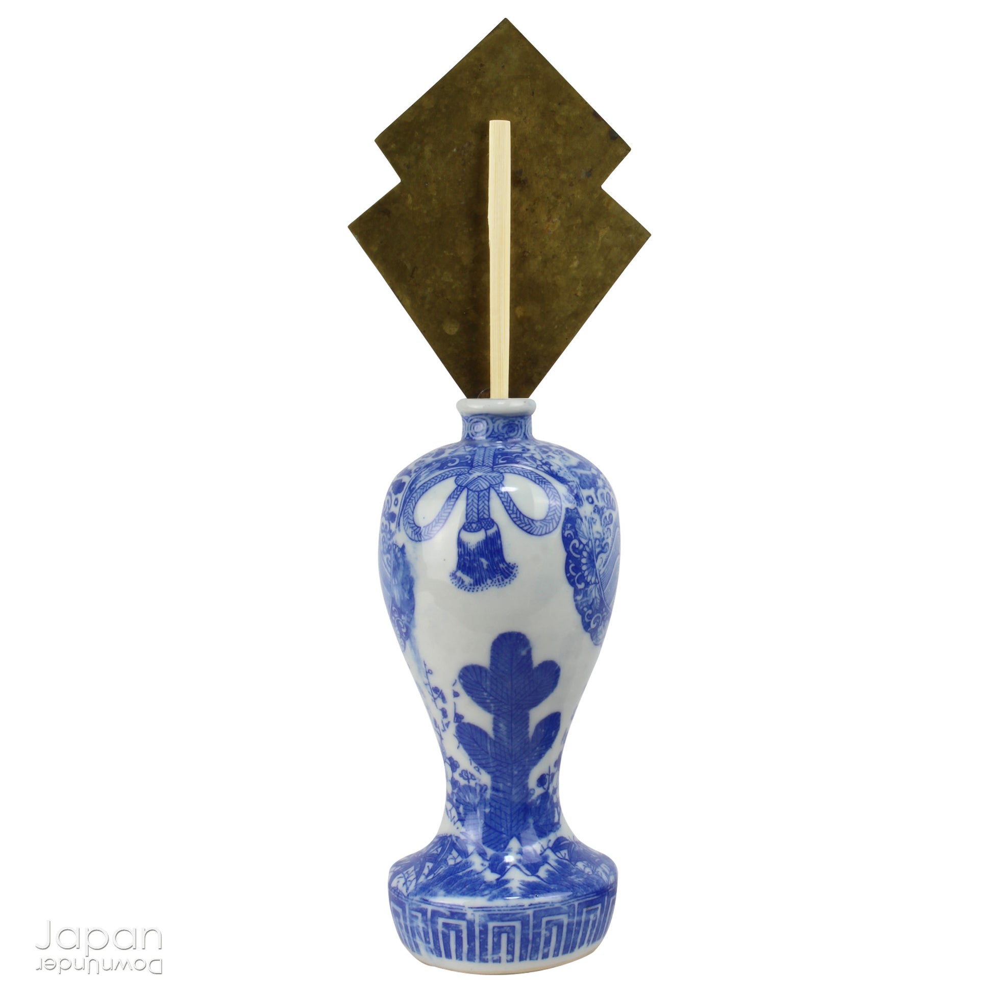 Enhance your sacred space with this wonderful pair of antique brass flames in old imari sake bottles, made to be offered at Shinto altars. Believed to attract prosperity and ward off evil, these unique pieces will bring a touch of tradition.