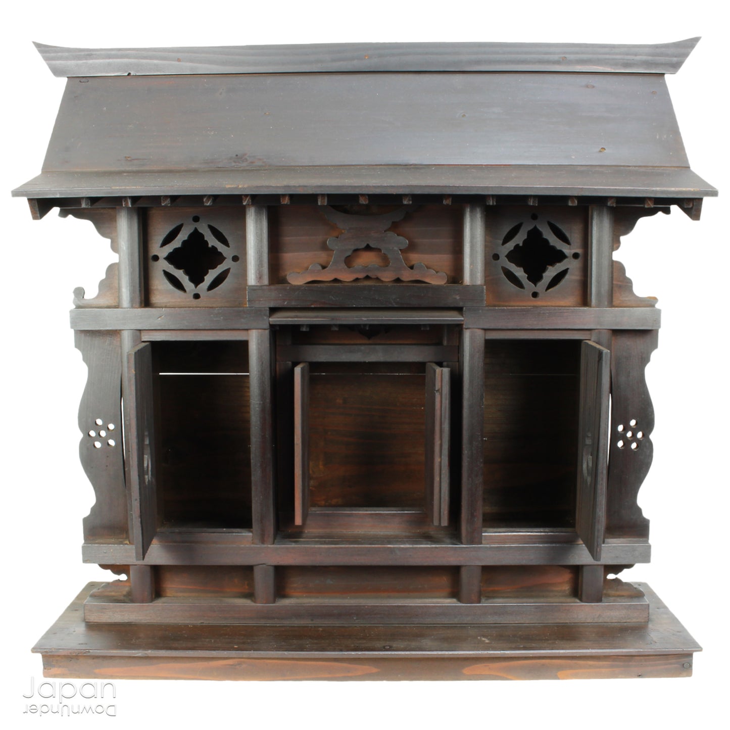 A wonderful antique folk art Japanese kamidana shrine that exudes a beautiful rustic charm, sure to add a touch of serenity to your living space. Crafted with intricate details and a timeless aesthetic.