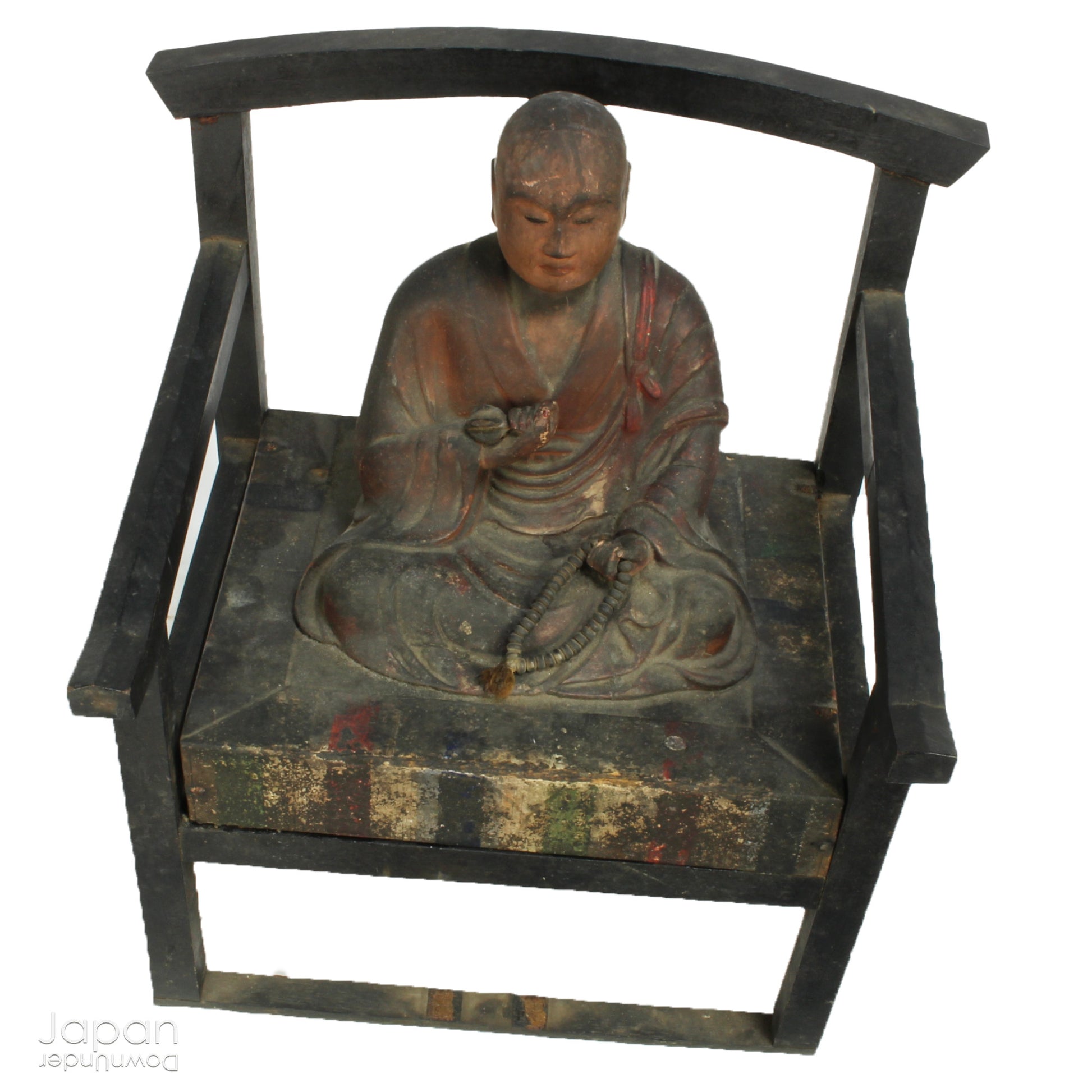 A wonderful piece of history, this large 1800’s wooden Buddhist statue captures Kukai seated in lotus pose, deep in meditation. The statue exudes tranquility and peace, perfect for meditation and mindfulness practices.