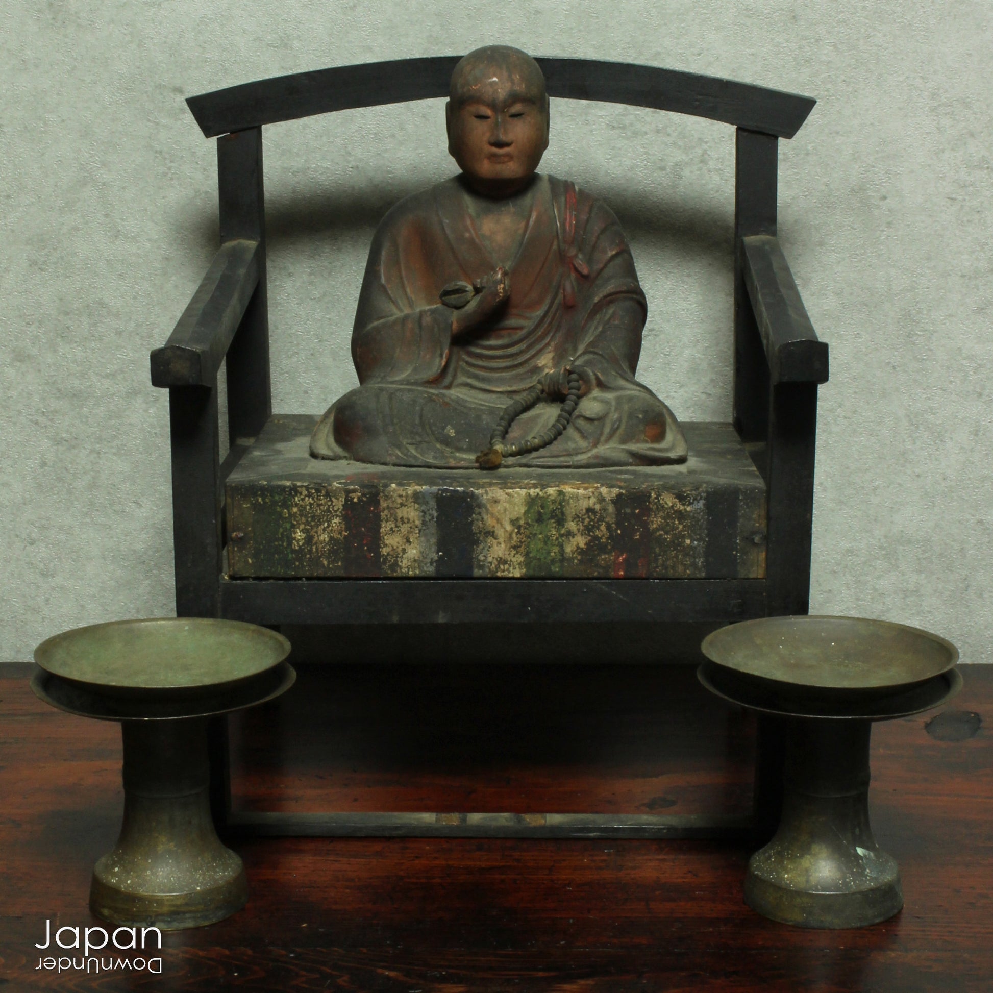 A wonderful piece of history, this large 1800’s wooden Buddhist statue captures Kukai seated in lotus pose, deep in meditation. The statue exudes tranquility and peace, perfect for meditation and mindfulness practices.