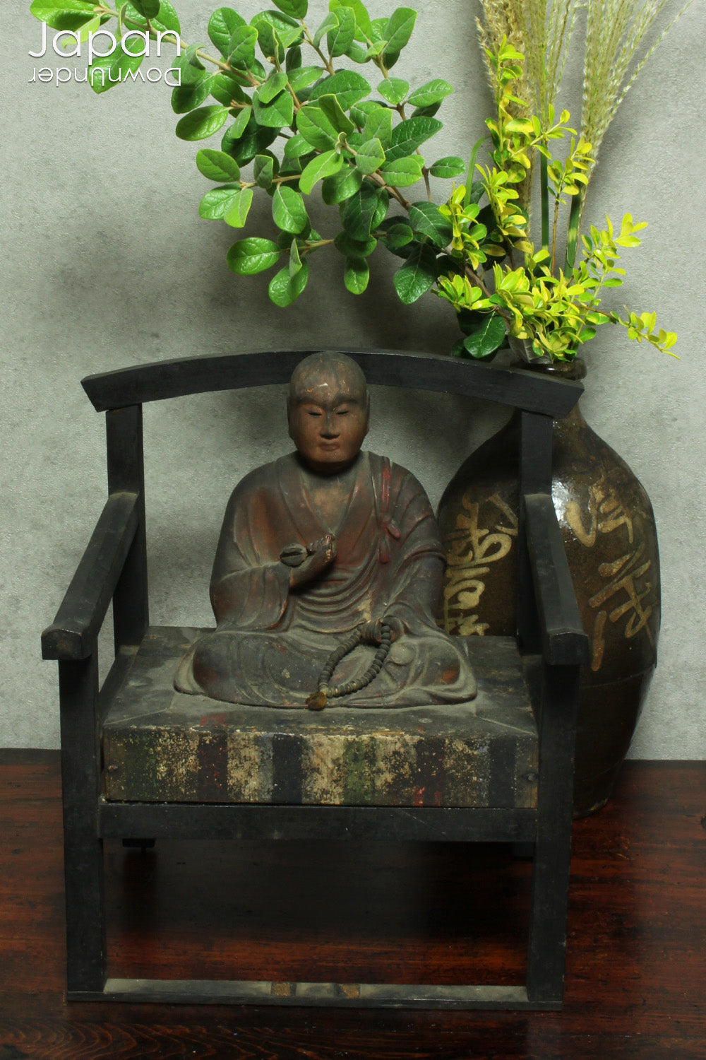 A wonderful piece of history, this large 1800’s wooden Buddhist statue captures Kukai seated in lotus pose, deep in meditation. The statue exudes tranquility and peace, perfect for meditation and mindfulness practices.