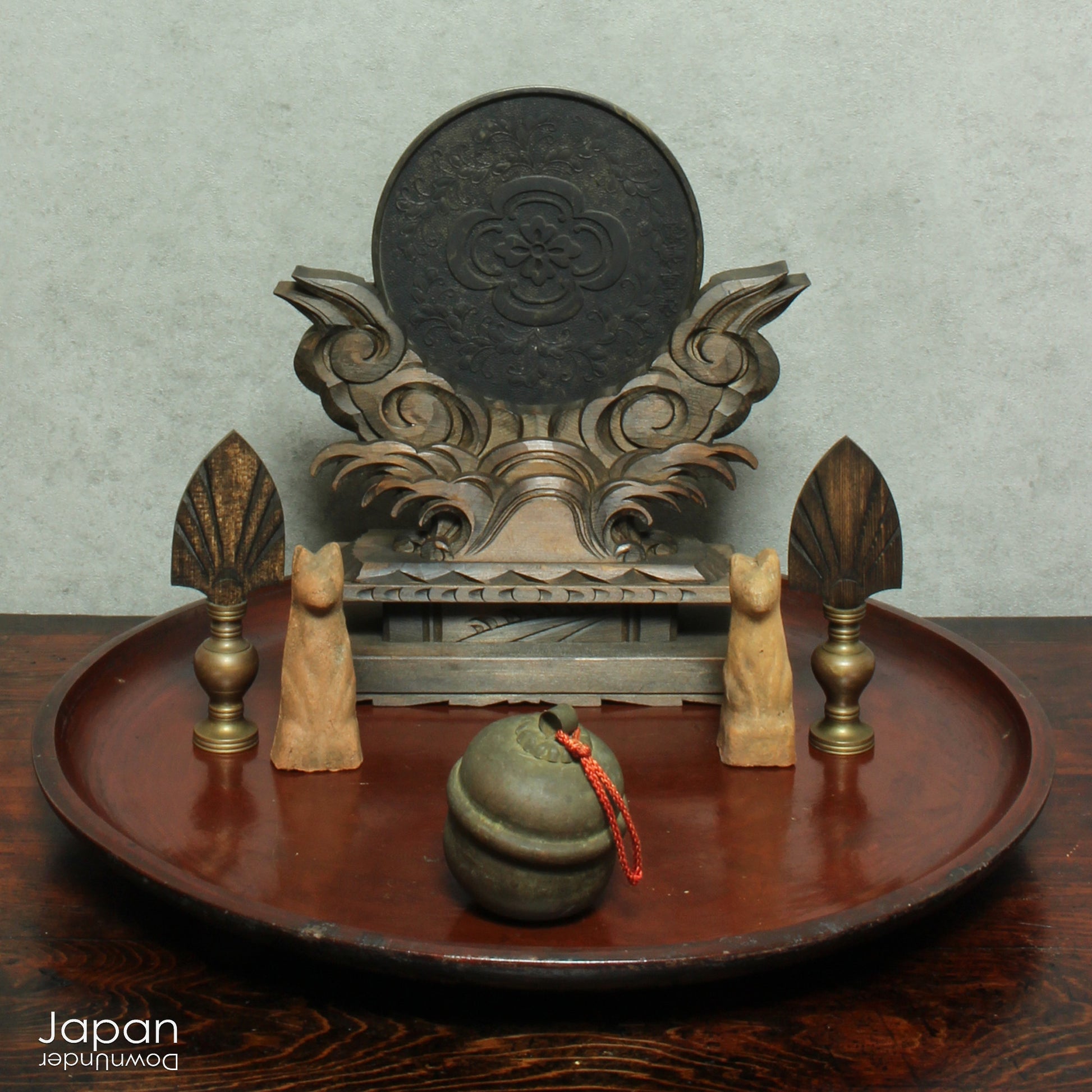 Infuse your home with serenity and spiritual elegance with this wonderful Shinto shrine mirror. Set upon an intricately carved wooden stand, this stunning piece is more than just a decor item—it’s a meaningful addition to any space that seeks harmony and balance.