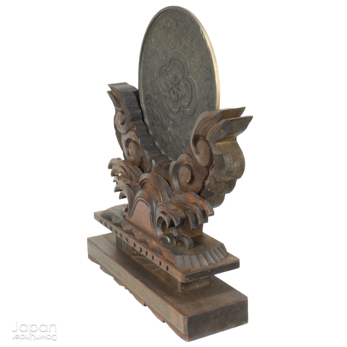 Infuse your home with serenity and spiritual elegance with this wonderful Shinto shrine mirror. Set upon an intricately carved wooden stand, this stunning piece is more than just a decor item—it’s a meaningful addition to any space that seeks harmony and balance.