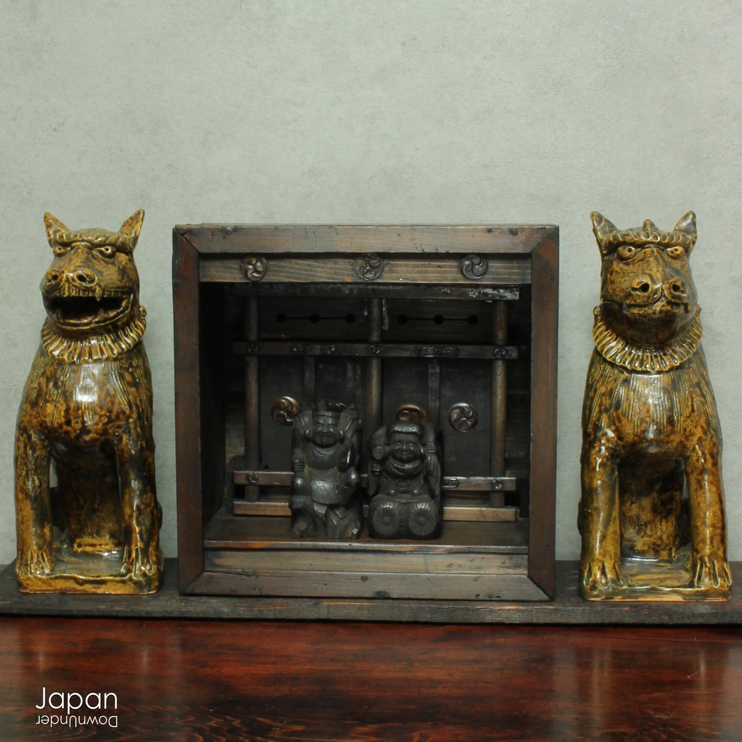 Bring an air of mystique and protection to your home with this stunning pair of antique stoneware lion dogs, known as Komainu. Revered in Japanese culture for centuries, these guardians are traditionally stationed at the entrances of Shinto shrines to ward off evil spirits and bring a sense of peace. With their captivating design and spiritual significance, they are sure to add a unique touch to your decor while embracing the ancient traditions of protection.