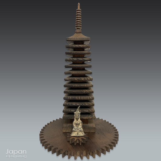 Elevate the energy of your space with this attractive wooden pagoda statue from the renowned Tanzan Shrine in Nara. &nbsp;Evoking serenity and peace, this timeless piece is more than just a decorative item—it's a symbol of good fortune, positive energy, and spiritual enlightenment. Perfect for bringing harmony into your home or office, it serves as a powerful and elegant reminder of life's blessings.