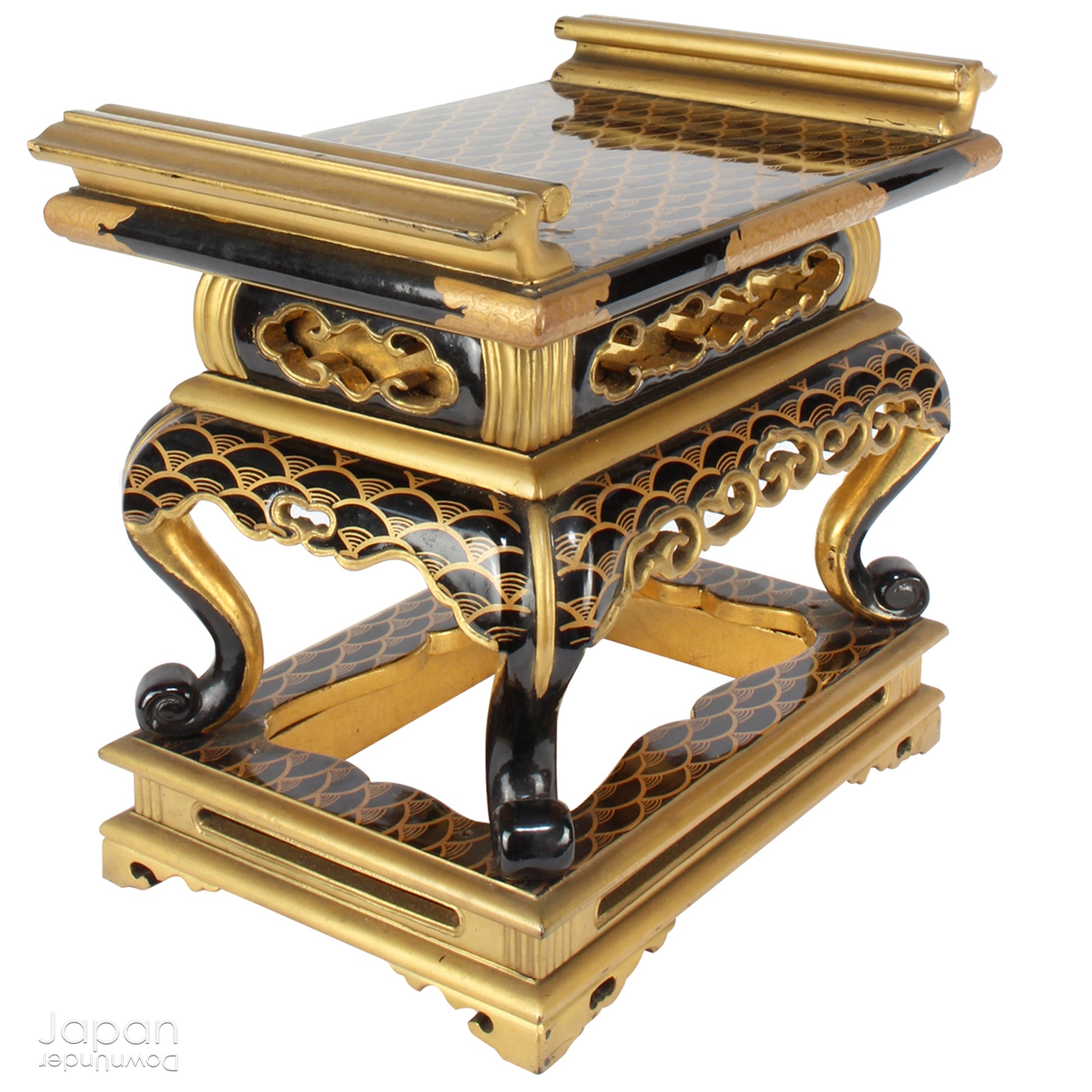 Add a touch of elegance to your space with this exquisite small antique Japanese sutra table. Intricately crafted with black lacquer and gold makie detailing, this table is perfect for displaying your favorite decor and religious items.