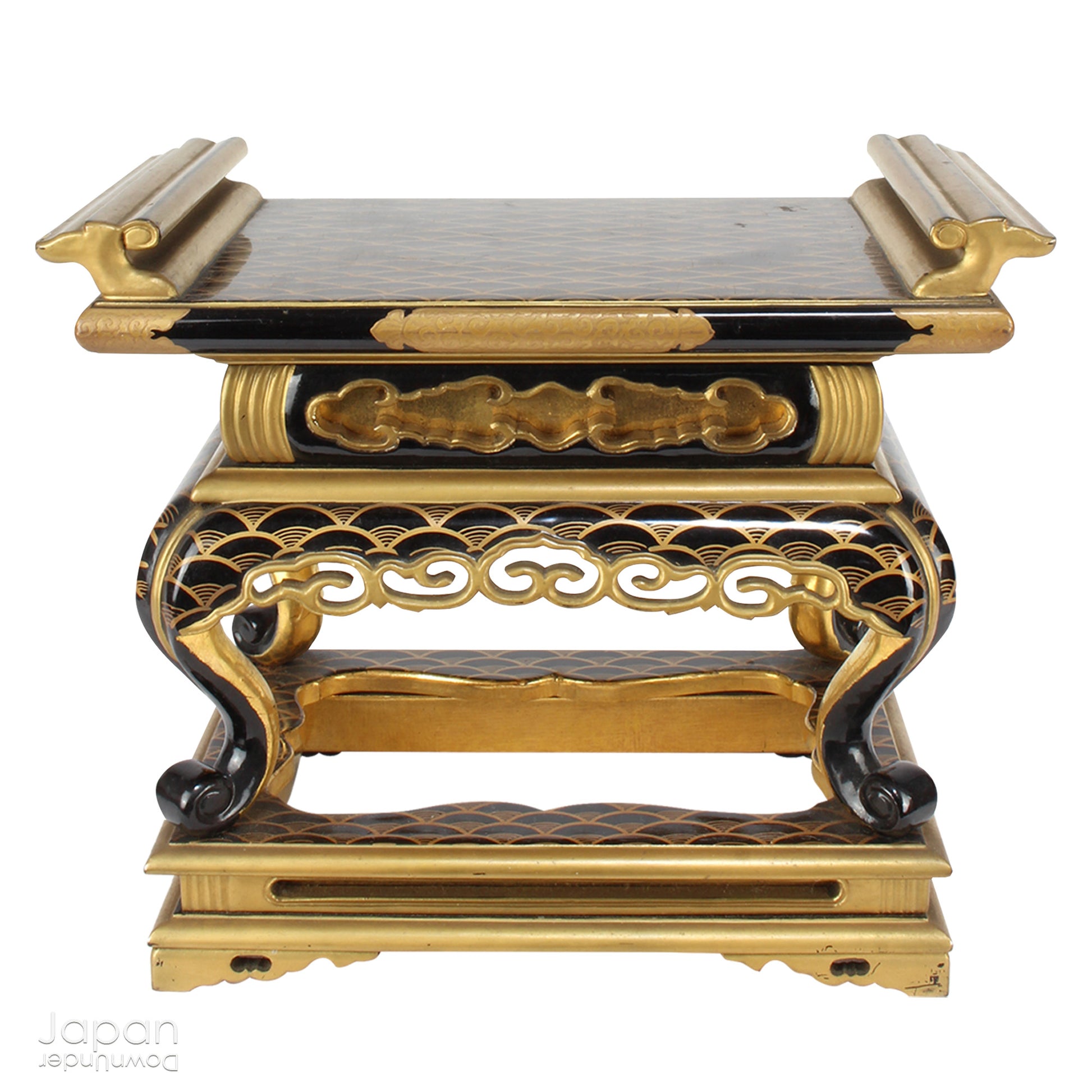 Add a touch of elegance to your space with this exquisite small antique Japanese sutra table. Intricately crafted with black lacquer and gold makie detailing, this table is perfect for displaying your favorite decor and religious items.